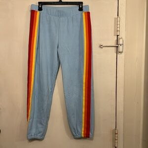 Bandier x Wesley NWT light blue joggers with bright stripes on the sides -size M